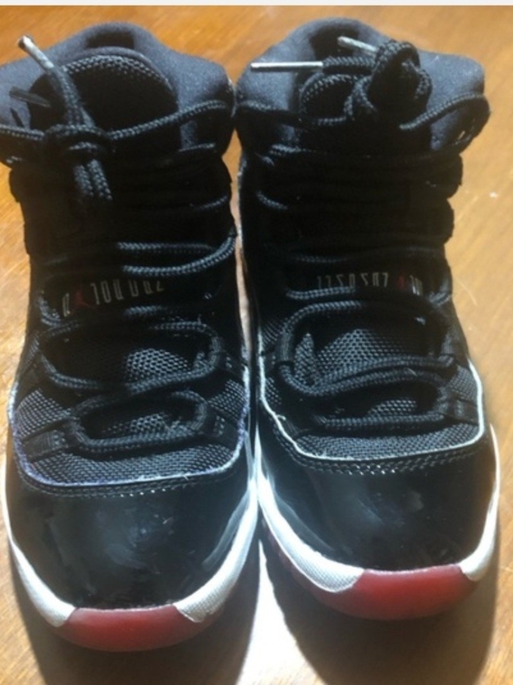 Jordan 11 Kids Black and Red High-Top Sneakers